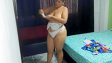 Young pervert is peeping on his curvy stepmother while she gets dressed