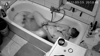 Son 'installs spy cam and catches mom masterbating in the tub while sexting with husband