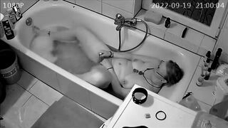 Son 'installs spy cam and catches mom masterbating in the tub while sexting with husband