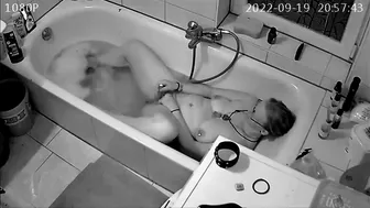 Son 'installs spy cam and catches mom masterbating in the tub while sexting with husband