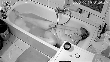 Son 'installs spy cam and catches mom masterbating in the tub while sexting with husband