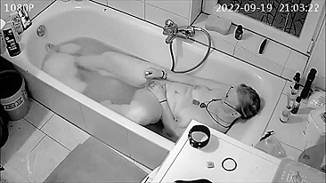 Son 'installs spy cam and catches mom masterbating in the tub while sexting with husband