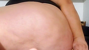 This is a video of a mother showing off her tits and fucking her stepson