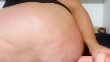 This is a video of a mother showing off her tits and fucking her stepson