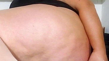 This is a video of a mother showing off her tits and fucking her stepson