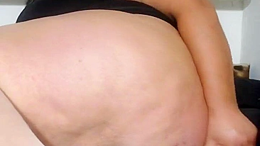 This is a video of a mother showing off her tits and fucking her stepson