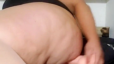 This is a video of a mother showing off her tits and fucking her stepson