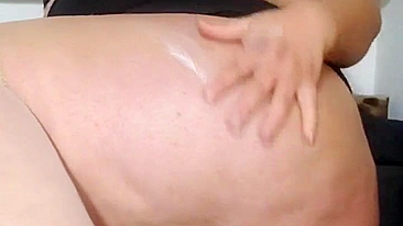 This is a video of a mother showing off her tits and fucking her stepson