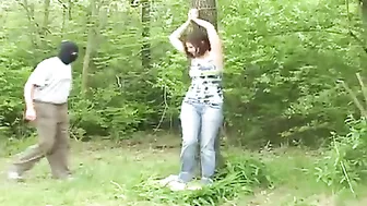 Busty girl kidnapped tied up and fucked in the woods, against her will