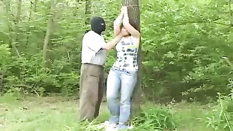 Busty girl kidnapped tied up and fucked in the woods, against her will
