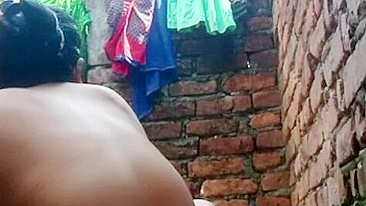 Desi girl caught and fucked, Village Bhabhi bathing nude in outdoor