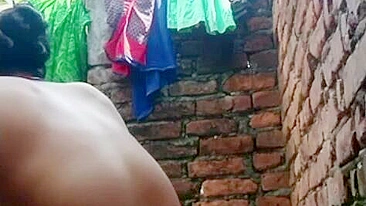 Desi girl caught and fucked, Village Bhabhi bathing nude in outdoor