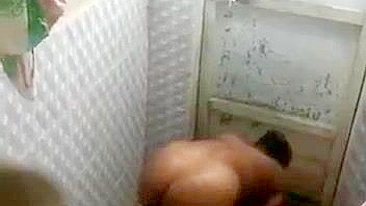 Hidden camera captures horny village aunty full nude bathing. Desi XXX video