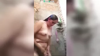 Village aunty bathing nude and caught on voyeur cam