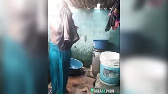 Desi XXX MMS, an older topless village aunt is caught on camera bathing