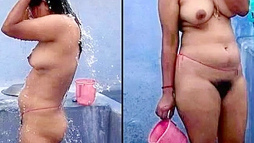 Desi XXX MMS, an older topless village aunt is caught on camera bathing