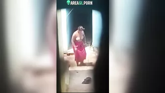 Huge tits village aunty topless bathing caught by spy cam