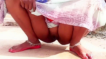 XXX video Indian aunty pissing outdoor and i see her hot pussy