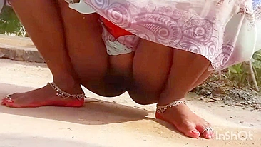 XXX video Indian aunty pissing outdoor and i see her hot pussy
