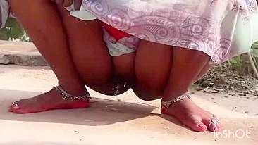 XXX video Indian aunty pissing outdoor and i see her hot pussy