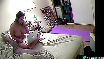 A curvy babe was caught masturbating on camera while in bed with her iPad.