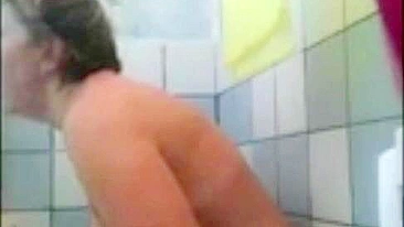Hidden camera gets caught mom masturbating using a shower head and jet water