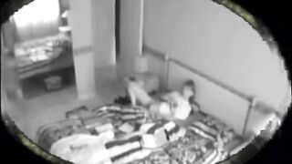 Hidden cam on ceiling in the hotel room catches woman masturbating