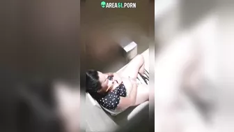 Hidden cam caught Indian aunty fingering in public bathroom