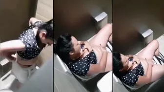 Hidden cam caught Indian aunty fingering in public bathroom