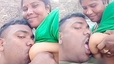 A village bhabhi's boobs are sucked out by her hubby in a TikTok video
