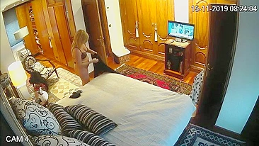 Caught on Camera: Son Spies on His Mom Changing Clothes After Work