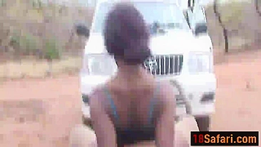Perfect looking African babe gets fucked somewhere in Safari