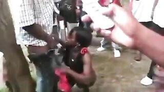 Mass Blowjob With One Shameless African Hooker In A Public Park