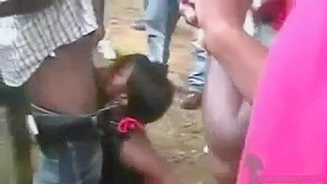 Mass Blowjob With One Shameless African Hooker In A Public Park