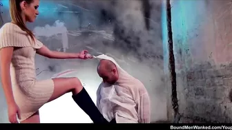 Strict young woman Alexis Crystal strokes cock of man tied to chair until it cums