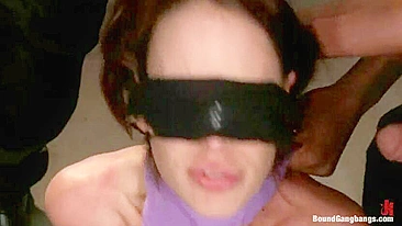Blindfolded woman with huge boobs has to suck black schlongs