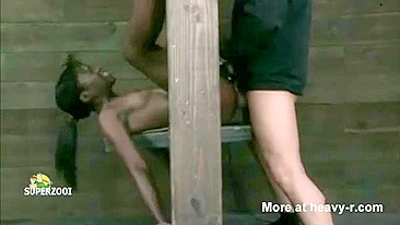 Restrained Ebony girl deepthroated and owned hard in BDSM video
