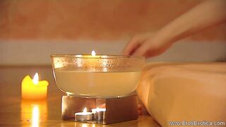 Petite young lady carefully gives her boyfriend oiled handjob in relaxing Oriental environment