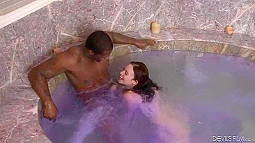 Cute babe and Ebony guy have nice time in big Jacuzzi