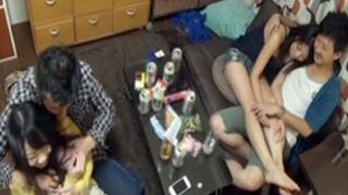 Two sultry women get surprised by two sneaky guys with hidden cameras during a wild sex session.