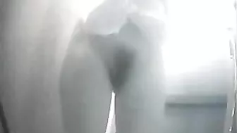 Japanese Beauty Take a Steamy Shower in Hidden Cam Video