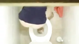 Sexy Young Student Caught in Public bathroom masturbating to porn magazine