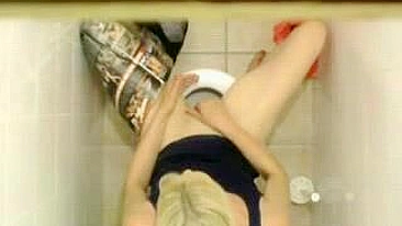 Sexy Young Student Caught in Public bathroom masturbating to porn magazine