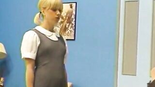 Shaved Schoolgirl Gets Spanked and Fingered