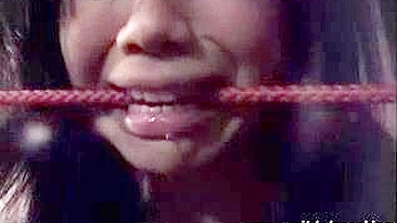 Young Asian woman receives intense spanking punishment.