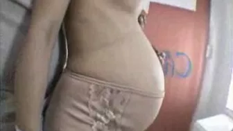 Capturing the Moment, Pregnant Woman Snaps Selfies in a Popular Store Capturing the Moment, Pregnant Woman Snaps Selfies in a Popular Store