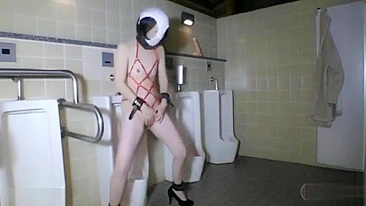 Uninhibited perv Japanese teen pleasures herself in the men's room