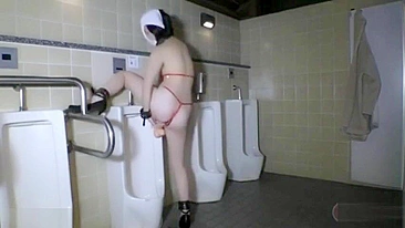 Uninhibited perv Japanese teen pleasures herself in the men's room