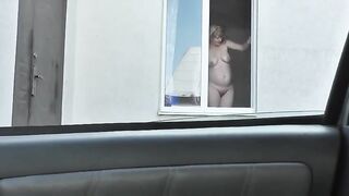 Spying from car on a neighbor who washes window completely naked,  public, voyeur