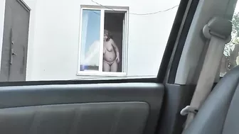 Spying from car on a neighbor who washes window completely naked,  public, voyeur
